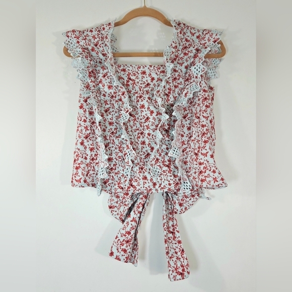 Blue Tassel Tops - ANTHROPOLOGIE BLUE TASSEL TRINA BACK BOW FLORAL BLOUSE.